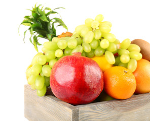 Assortment of fruits in box isolated on white