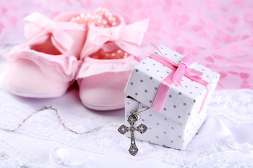 Baby shoe and cross for Christening