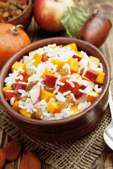 Sweet pilaf with pumpkin, apples and dried fruit