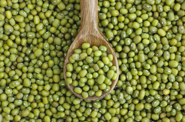 Mung beans (mash) in wooden spoon