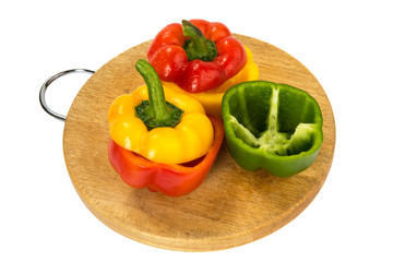 Paprika of different color on a board