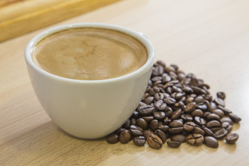 Espresso coffee white mug and beans