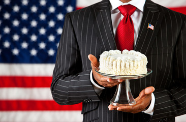 Politician: Holding a Cake on Cake Stand