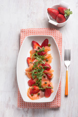 smoked salmon salad with strawberries arugula and capers