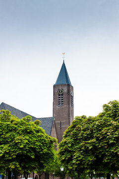 Church Tower In Bussum