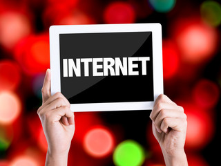 Tablet pc with text Internet with bokeh background