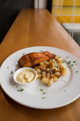 Salmon steak with baked potato