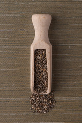 Wooden scoop with chia seeds