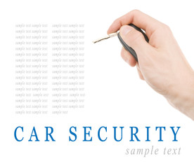 Hand holding car keys isolated on white background
