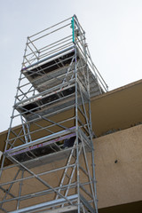 A urban apartments wall restoration works and scaffolding