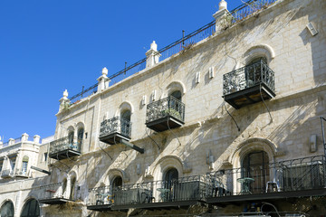Naklejka premium Wrought-iron balconies on the streets of Jerusalem