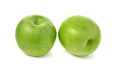 Green apples on white background, focus on apple