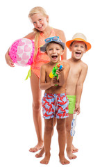 Three happy kids in a swimsuit standing together, isolated on wh