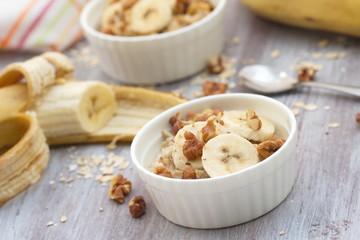 Oatmeal with banana, honey and walnuts for breakfast