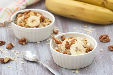 Oatmeal with banana, honey and walnuts for breakfast