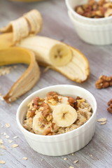 Oatmeal with banana, honey and walnuts for breakfast