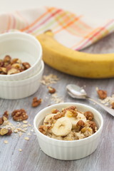 Oatmeal with banana, honey and walnuts for breakfast