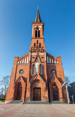 Fototapeta na wymiar Catholic Cathedral on the Pastavy town.