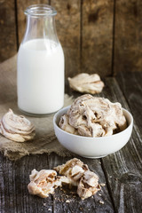 Homemade  meringues with brown chocolate stripes