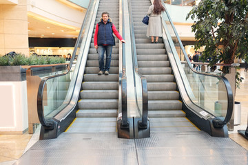 The man on the escalator at the mall