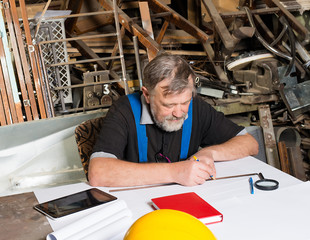 engineer at work, drawings, documents