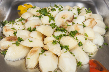 Boiled potatoes on display at a restaurant buffet