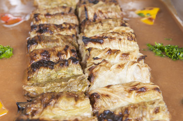 Stuffed cabbage rolls at a restaurant buffet