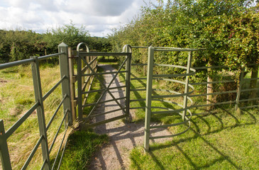Iron kissing gate in good condition. Type of stile style.