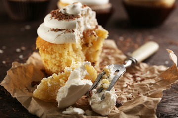 Delicious cupcakes on table close-up