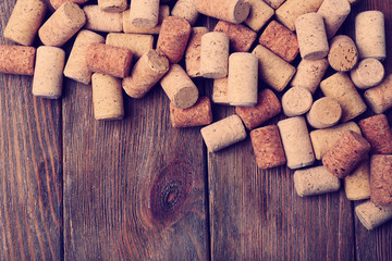 Wine corks on wooden background