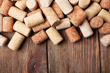 Wine corks on wooden background