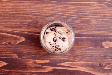 Delicious chocolate chip cookies on the board top view