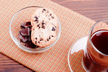 chocolate chip cookies with coffee on the board top view