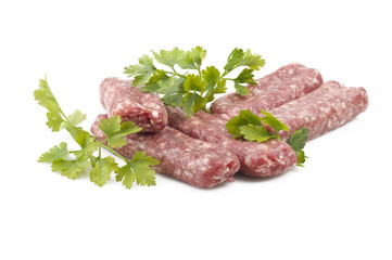 sausage with parsley leaves on the white