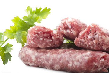 sausage with parsley leaves on the white