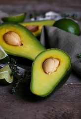 Sliced avocado with lime and herb