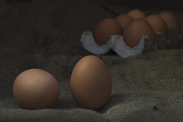 Eggs on sackcloth background