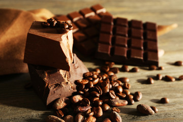 Still life with set of chocolate with coffee grains, closeup