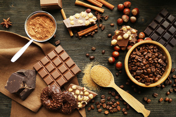 Still life with set of chocolate, nuts and spices