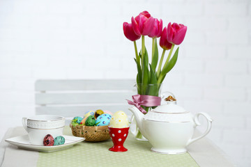 Easter table setting, on light background