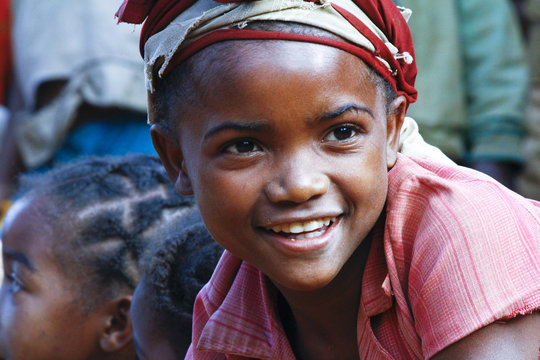 Very Pretty Malagasy Child Smiling In The Vilage- Poverty