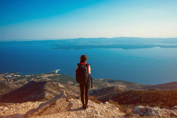 Fototapeta premium Woman traveling on the island top