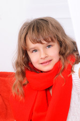 little girl in red scarf