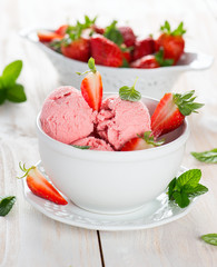 strawberry ice cream served with fresh ripe strawberries