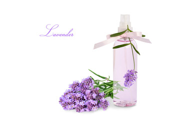 Lavender product in spray bottle and flowers isolated