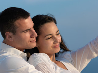 Fototapeta premium happy young romantic couple have fun arelax relax at home
