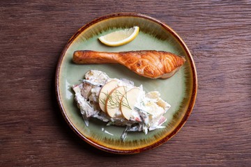 salmon steak with fruit salad