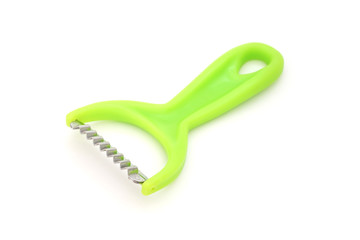 grater with green plastic handle on white background