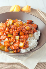 chicken cashew nuts in brown bowl