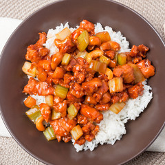 chicken cashew nuts in brown bowl